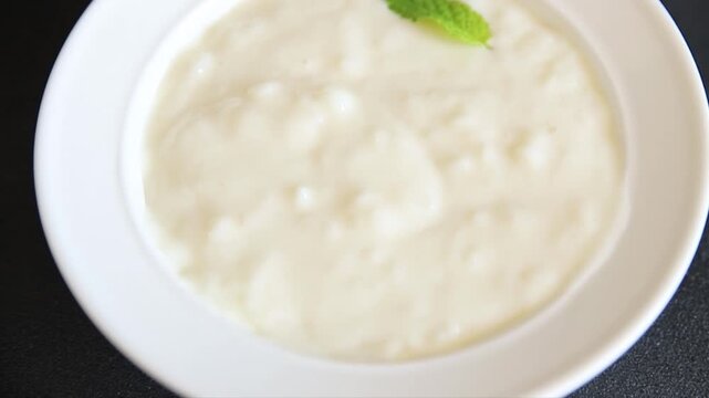 Sweet rice porridge healthy breakfast, vanilla dessert food preparation tasty snack fresh gourmet food background on the table rustic food top view copy space