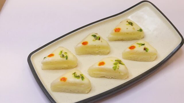 Malai sandwich or malai cham cham beautifully plated on white plate