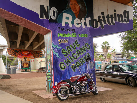 Harley Davidson Motorcycle and Lowrider at Chicano Park Murals in San Diego California