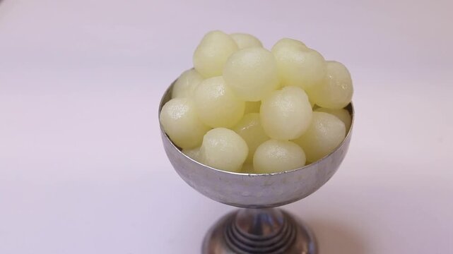 Rasgulla an indian dessert white balls dipped in sugar syrup