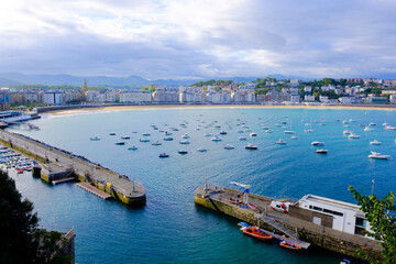 Fototapeta premium La Concha Bay and Harbor in San Sebastian at Night, Basque Country, Spain