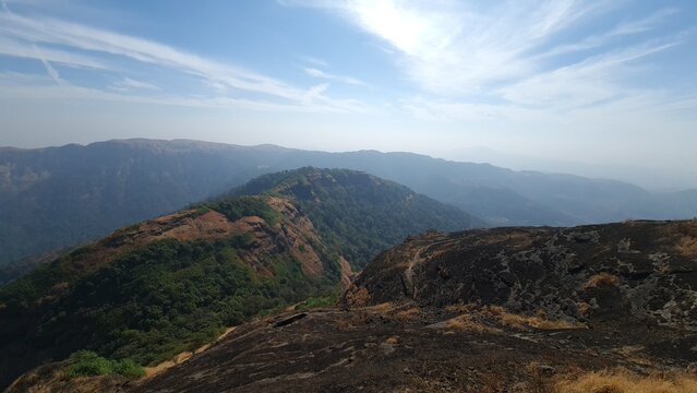 Rugged mountain landscape and forested valley in the Western Ghats of Maharashtra India
