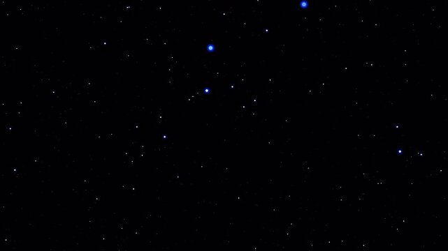 Glowing blue stars moving across a dark star field with alpha channel, creating a deep space and cosmic background effect