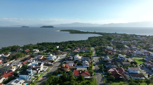 Florian&oacute;polis, Daniela Beach. Aerial View of Tropical Coastline. Establishing Shot. Santa Catarina, Brazil.