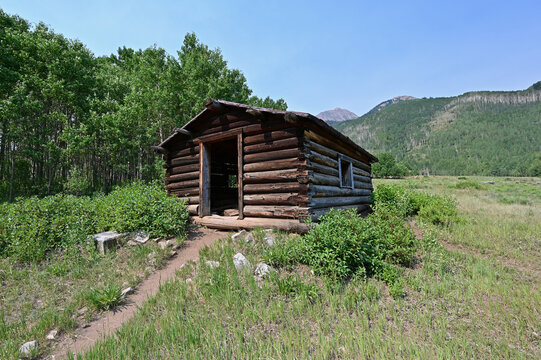 Long abandoned buildings of Ashcroft Ghost Town in Castle Creek Valley near Aspen, Colorado on sunny summer morning.