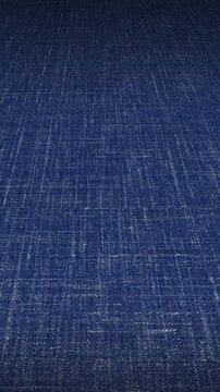 Detailed sweep over Italian denim blue slub wool linen blend fabric highlighting unique rustic thread variations and lightweight summer suiting weave