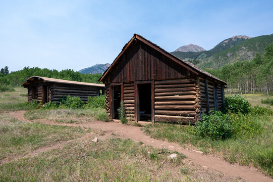 Long abandoned buildings of Ashcroft Ghost Town in Castle Creek Valley near Aspen, Colorado on sunny summer morning.
