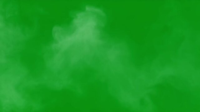 Realistic white fog rising on green chroma key for video production and editing