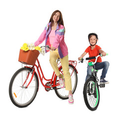 Fototapeta premium Mother and son with bicycles on white background
