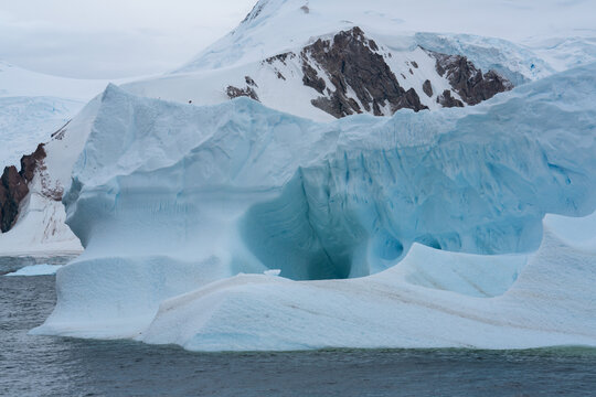 Antarctica, antarctic Peninsula, after crossing the circle line. beautiful Landscape along the Bouregois Fjord with floating Icebergs and ice floes.