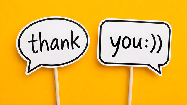 Playful thank you speech bubbles on a bright yellow background conveying gratitude appreciation customer service communication and positive feedback