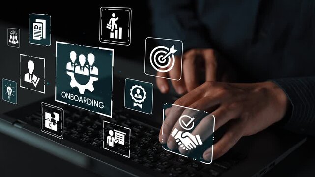 Hands on Laptop Displaying Virtual Onboarding Process with Various Icons Representing Employee Engagement and Integration in Modern Work Culture. Entropy.
