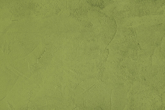 Khaki stucco wall, uneven plaster surface, painted distressed concrete texture background. Abstract grunge backdrop, wallpaper for design, construction design element