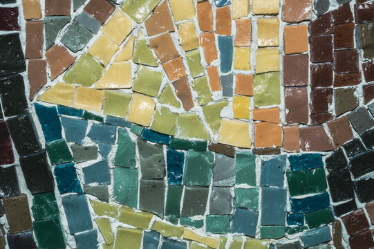 Organic mosaic texture with earthy greens and warm yellows transition
