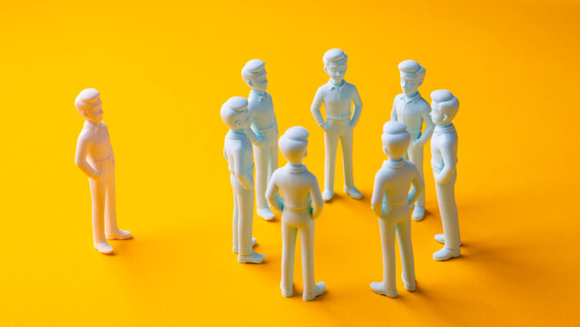 Workplace exclusion and social isolation with one person separated from group