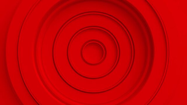 Vibrant red 3D concentric circles expanding in smooth concentric ripples with soft depth shadows. Perfect for target bullseye visuals, audio soundwave pulsation, background textures, and high-energy m