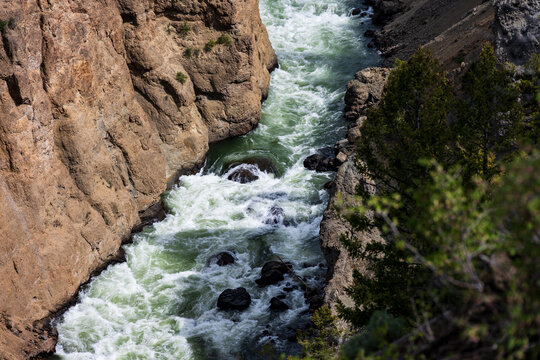View of scenic cliff and canyon off the Grand Loop road with the Yellowstone River at the bottom, Yellowstone National Park, summer vacation destination for outdoor nature recreation
