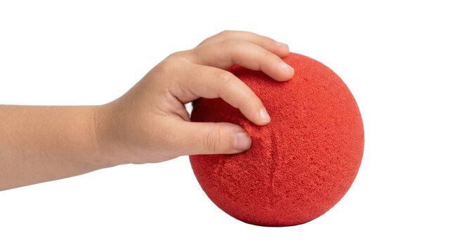 Child s hand holding a red foam ball PNG Isolated on transparent background