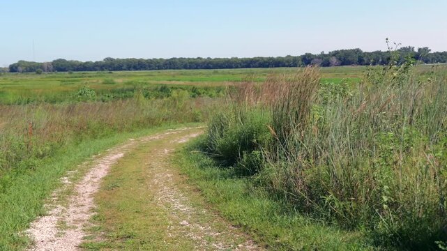 Midwestern conservation biological science land resources dedicated to protecting wetlands, open water, and riparian habitats within Lawrence Kansas