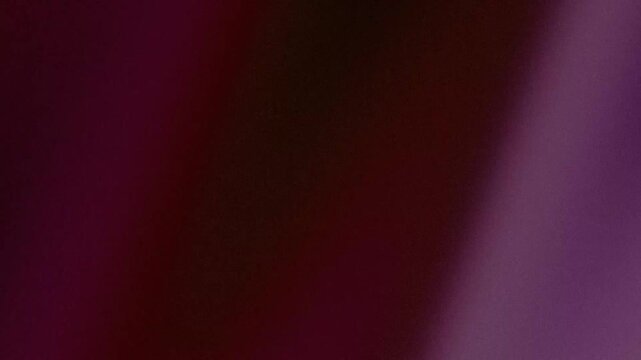 Abstract Dark Purple and Magenta Blurred Gradient Background