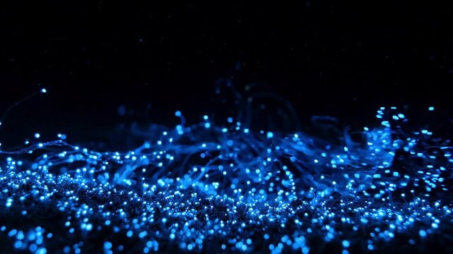 Abstract Glowing Blue Particle Waves and Bioluminescent Light Strands on Dark Background