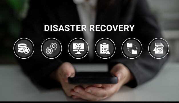 Image of hands holding a smartphone featuring disaster recovery icons, symbolizing data backup, business continuity, and emergency preparedness strategies for organizations. Ledger