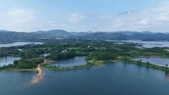 Aerial View of Huiting Reservoir and Distant Mountains, Jingshan, Hubei, China