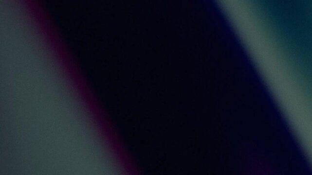 Dark moody abstract background with grainy texture and color gradient