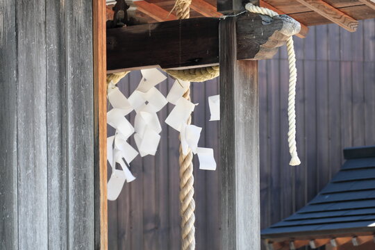 Shimenawa rope and shide paper at Japanese Shinto shrine