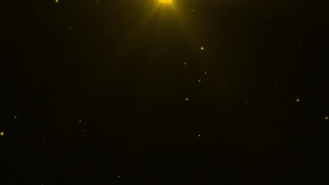 Animated golden glowing particles and soft light rays on dark background with alpha channel, ideal for luxury, festive, magical and elegant visual effects
