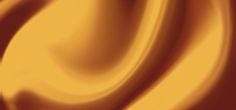 Golden satin fabric with smooth flowing folds and warm amber tones