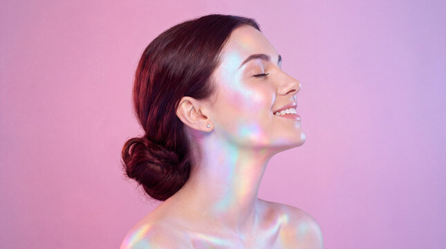 Woman in side profile with pastel rainbow glow