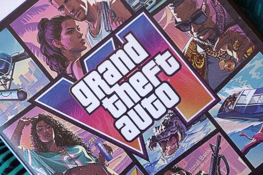KYIV, UKRAINE - 12 AUGUST 2026 Grand Theft Auto Six GTA 6 video game disc with original cover art