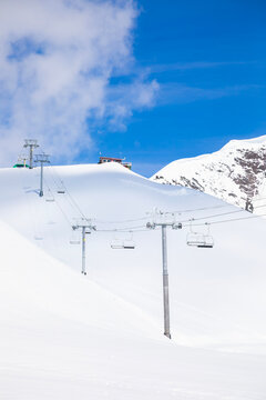 ski resort lift in winter with snow, vertical