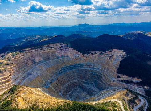 Rosia Poieni copper mine, a massive open pit mine located in the Apuseni Mountains of Transylvania, Romania