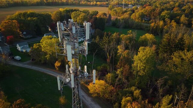 Cell Tower Antennas Above Autumn Countryside