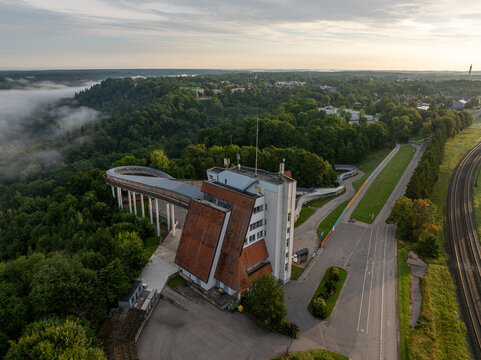 Aerial view of Sigulda Bobsleigh and Luge Track surrounded by morning mist in Latvia