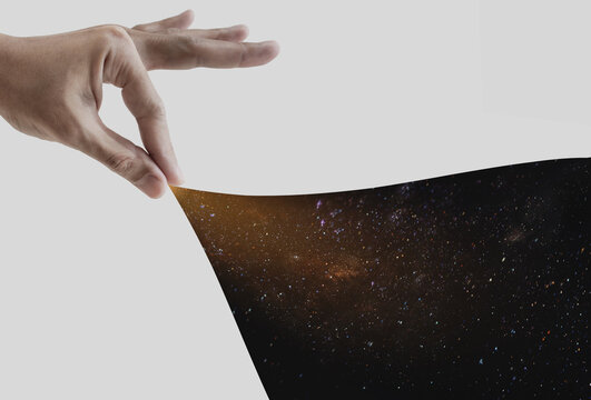 Hand opening white background, on space full of stars background

