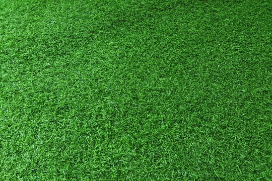 ​High angle view of seamless green artificial grass lawn texture background