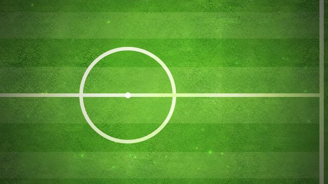 Animation of an empty football field viewed from above, with floating particles drifting across the pitch and open space