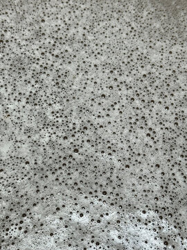 View of dense soap bubbles and foam texture suds lather