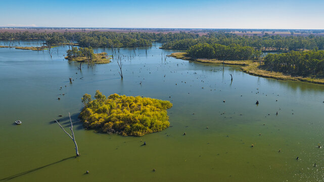 Lake Mulwala wetlands with small fishing boat and island