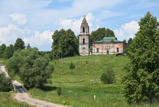 A summer landscape with a half‑ruined Orthodox church.