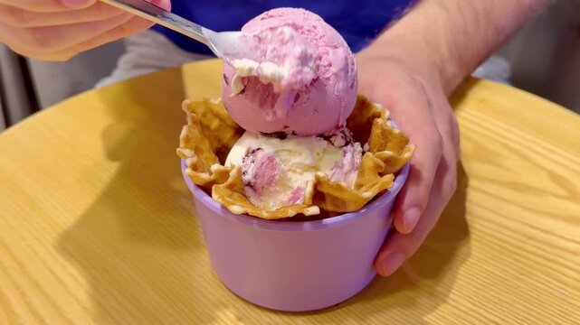 Close Up of Ice Cream Scoop in Bowl with Hand Holding Spoon ,Sweet Dessert