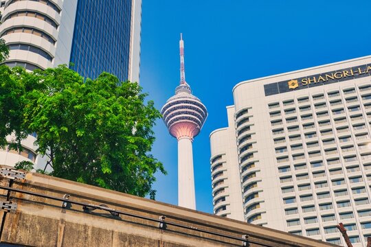 KUALA LUMPUR, MALAYSIA - OCTOBER 18, 2024: KL Tower view from street on October 18, 2024.This was on a hot sunny day in Asia during the wet season. This was in the heart of the city centre.

