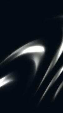 Dark abstract flowing satin fabric with light reflections, elegant motion