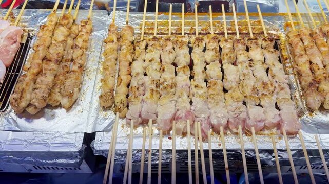 Grilled Meat Skewers on Korean Street Food Griddle &ndash; Hot Chicken Sticks