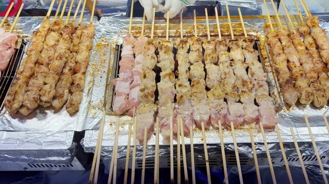 Grilled Meat Skewers on Korean Street Food Griddle &ndash; Hot Chicken Sticks