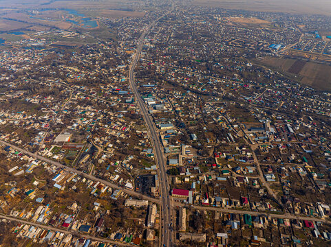 Aerial View of Residential Area with Central Highway