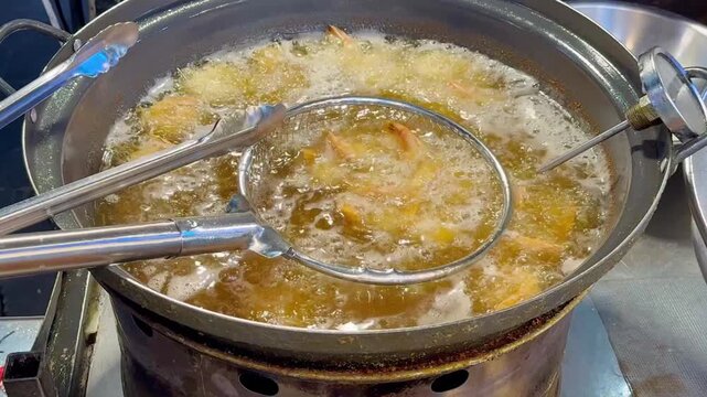 Korean Street Food &ndash; Deep Frying Fresh Shrimp in Hot Oil at Outdoor Market Stall